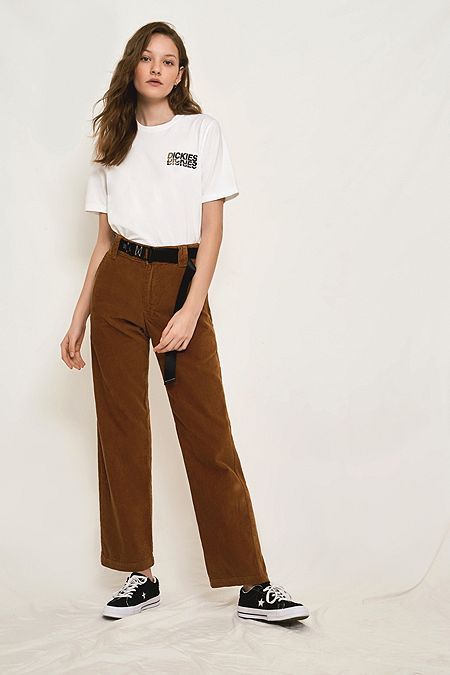 Brown Trousers with a White T- shirt Brown Trousers with a White T- shirt