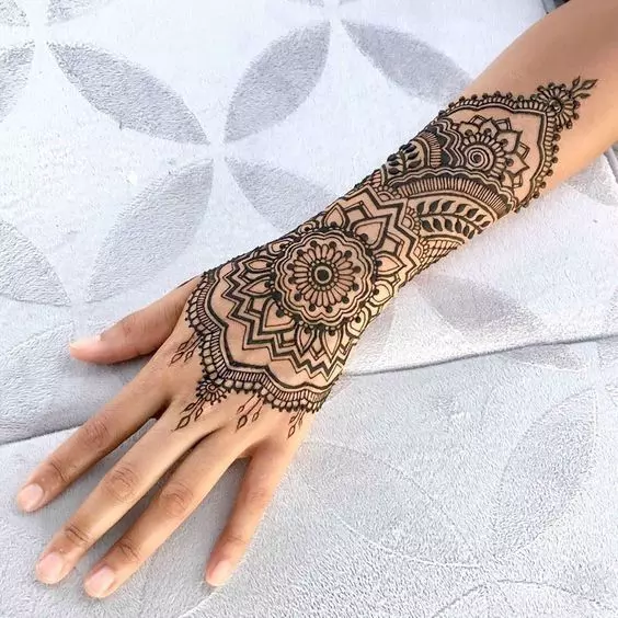 14. Abstract Ring Ceremony Mehndi Designs for Engagement Bride