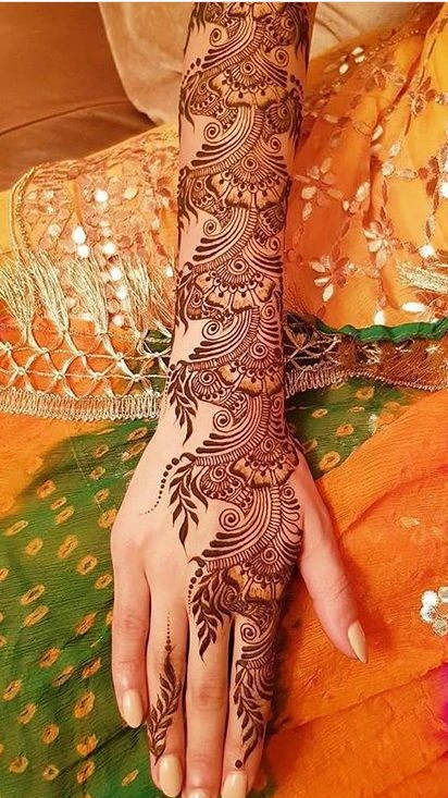 3. Arabic Bridal Back Hand Mehndi Designs 3. Arabic Bridal Back Hand Mehndi Designs