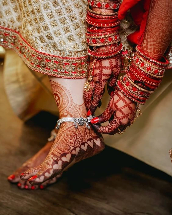 6. Cursive Writing Bride Leg Mehndi Design 6. Cursive Writing Bride Leg Mehndi Design