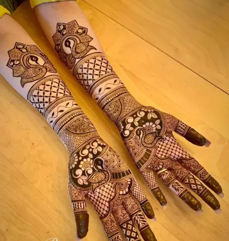 4. Peacock Ring Ceremony Mehndi Designs for Engagement Bride