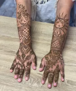 9. Sun and Moon Ring Ceremony Mehndi Designs for Engagement Bride