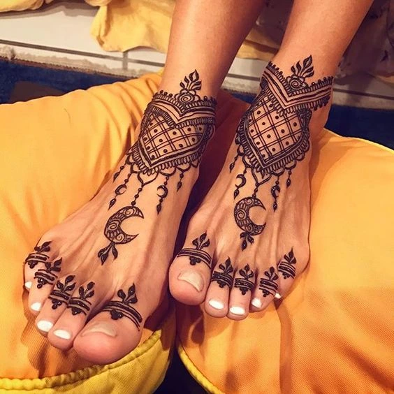 7. Symbolical Bride Leg Mehndi Designs 7. Symbolical Bride Leg Mehndi Designs