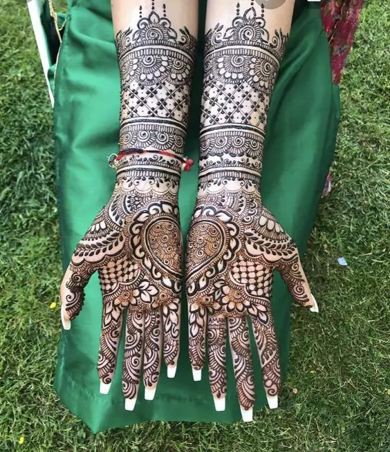 10. Heart Full Hand Mehndi Designs for Brides 10. Heart Full Hand Mehndi Designs for Brides