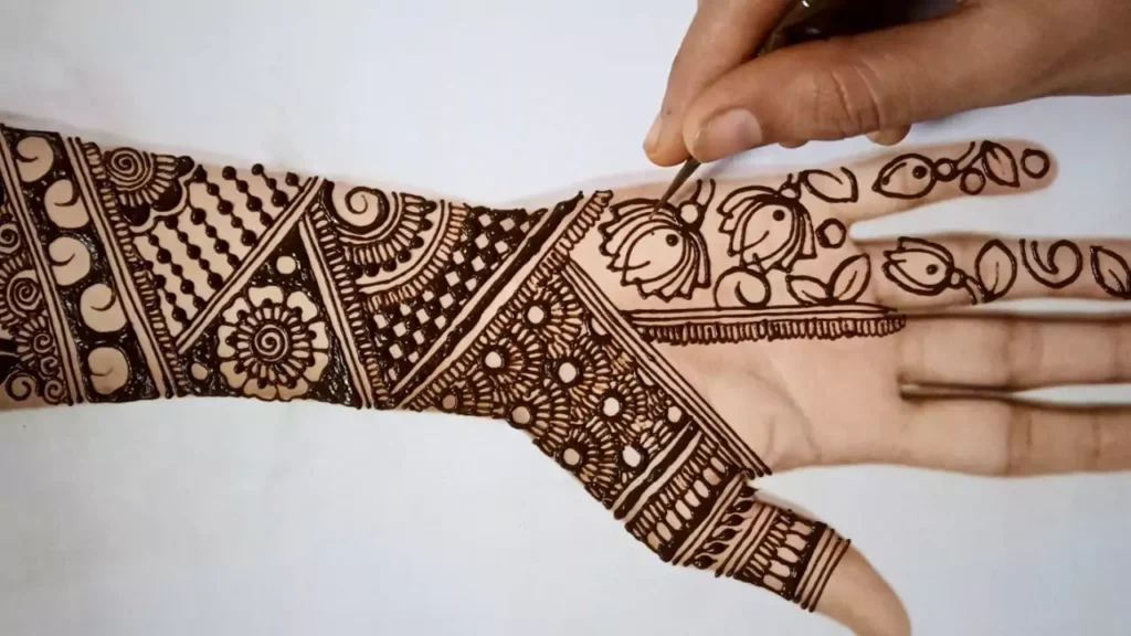 6. Zig Zag Bridal Back Hand Mehndi Designs 6. Zig Zag Bridal Back Hand Mehndi Designs
