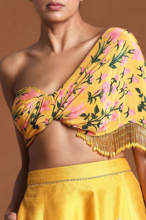 20. Haldi Outfit Ideas for Bride with a Statement Blouse 20. Haldi Outfit Ideas for Bride with a Statement BlouseÂ