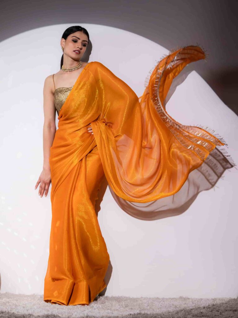 3. An Elegant Saree 3. An Elegant Saree - Haldi Outfit Ideas