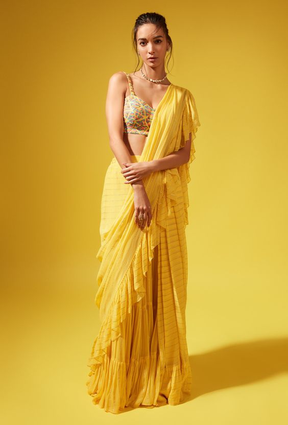 9. Ruffled Saree 9. Ruffled Saree - Haldi Outfit Ideas