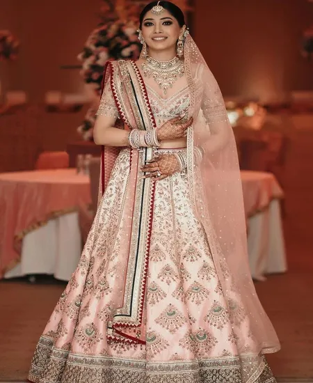 Dupatta Pinned Low on the Bun- Dupatta ideas for lehenga